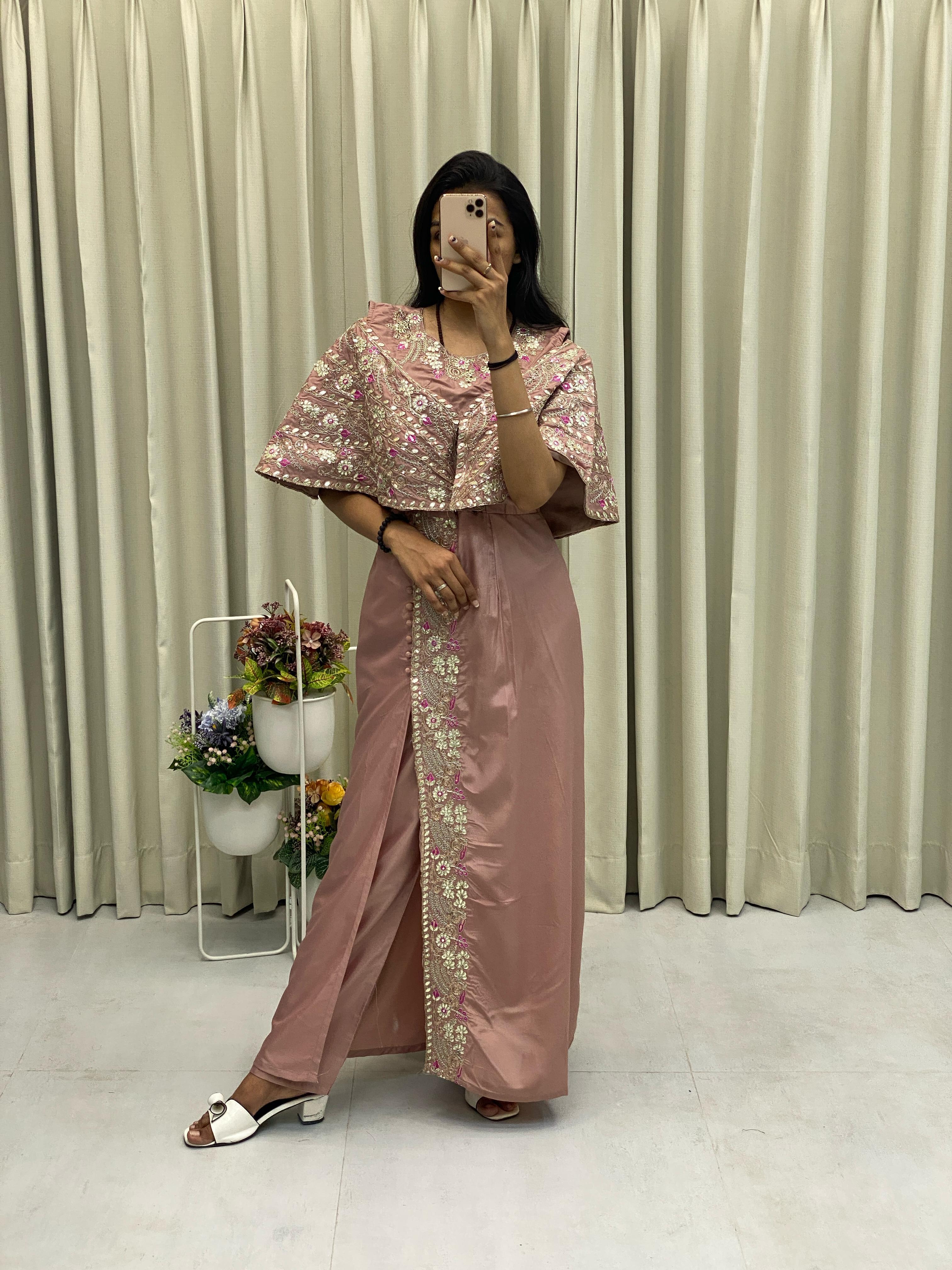 Full-length image of the Western-style gown highlighting its floor-length design and detailed work.

